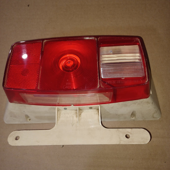 Used Microflex Taillight Assembly, With License Plate Bracket