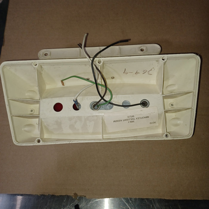 Used Microflex Taillight Assembly, With License Plate Bracket