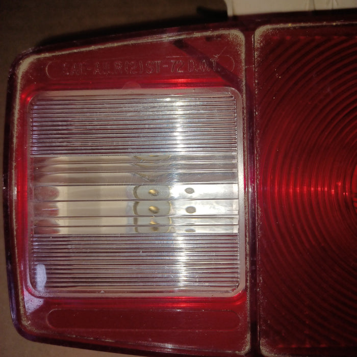 Used Microflex Taillight Assembly, With License Plate Bracket