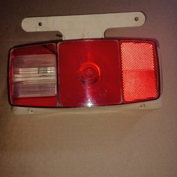 Used Microflex Taillight Assembly, With License Plate Bracket