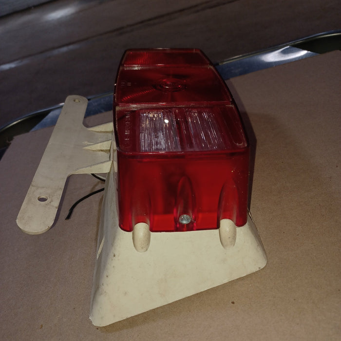 Used Microflex Taillight Assembly, With License Plate Bracket