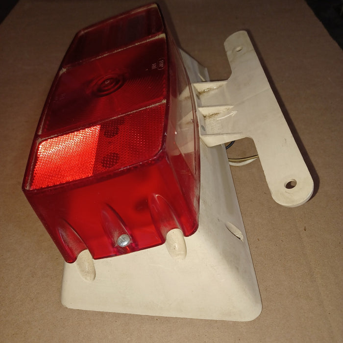 Used Microflex Taillight Assembly, With License Plate Bracket