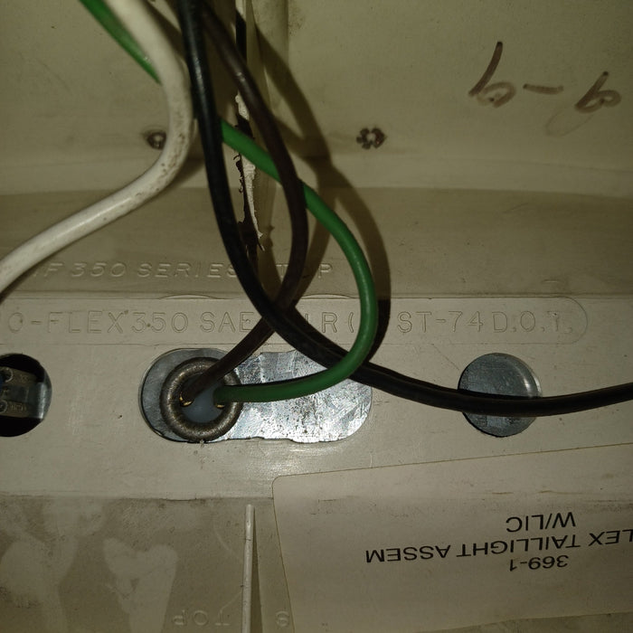 Used Microflex Taillight Assembly, With License Plate Bracket
