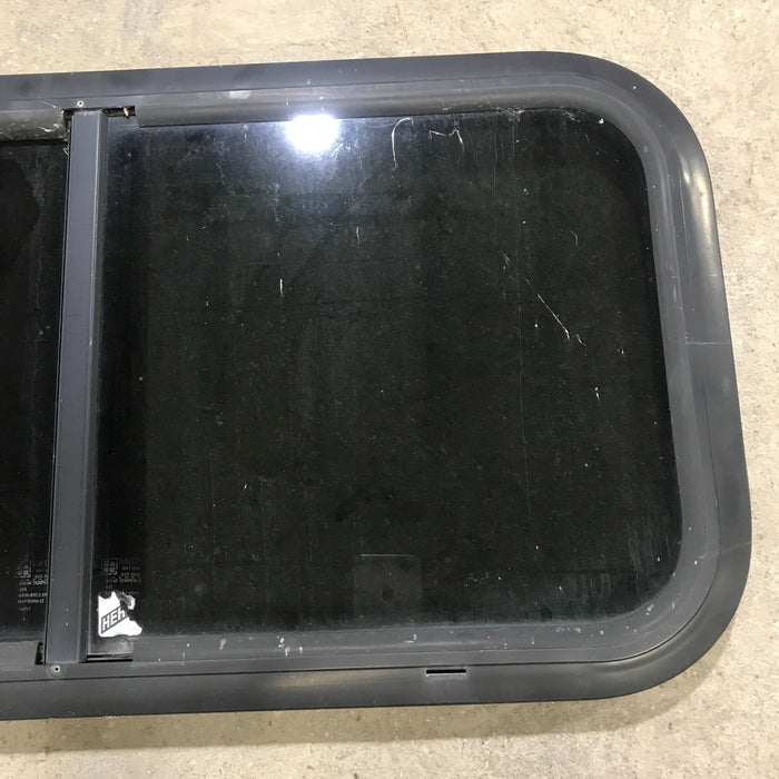 Used Black Radius Opening Window : 29.5" X 14.5" X 1.5"