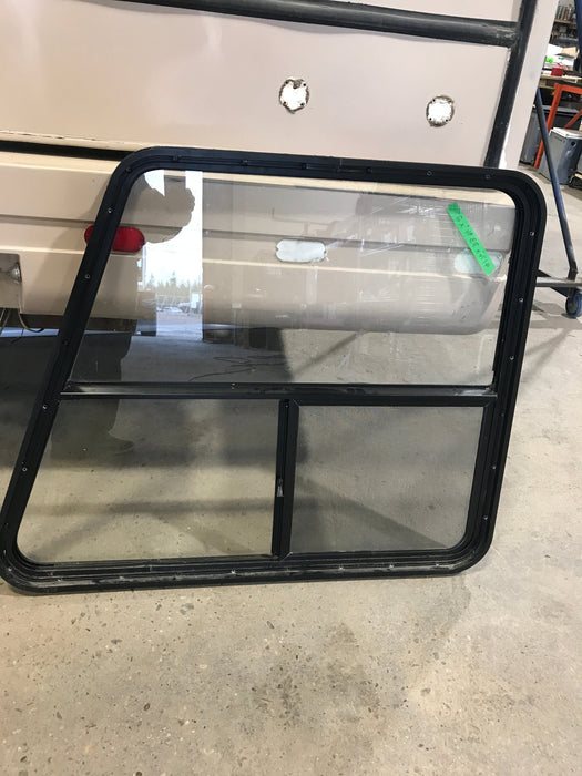 Used Slanted Black Radius Opening Window : 41 1/4" W x 33 3/4" H x 2" D - Young Farts RV Parts