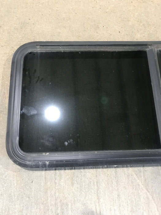 Used Black Radius Emergency Opening Window : 41 1/2" W x 21 1/2" H x 1 7/8"