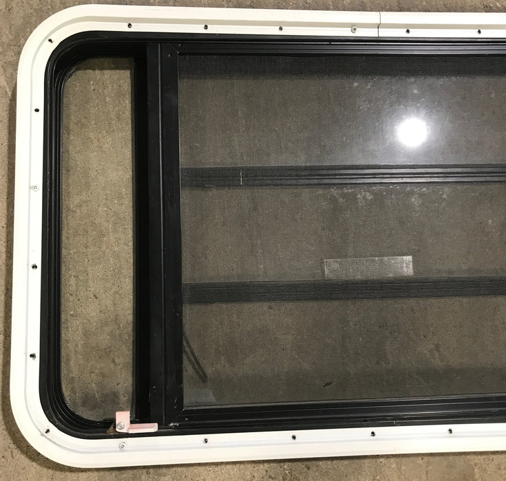 Used Black Radius Emergency Opening Window : 35" W x 21 1/4" H x 1 7/8" D