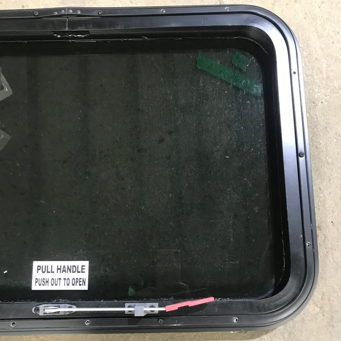 Used Black Radius Emergency Opening Window : 29.5" X 19.5" X 1.5"