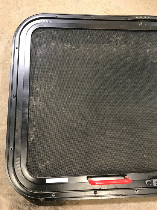 Used Black Radius Emergency Opening Window : 29.5" X 19.5" X 1.5"
