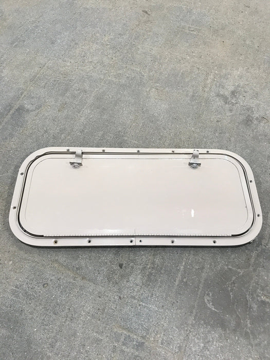 Used Radius Cargo / compartment Door 23 3/4" W x 9 3/4" H