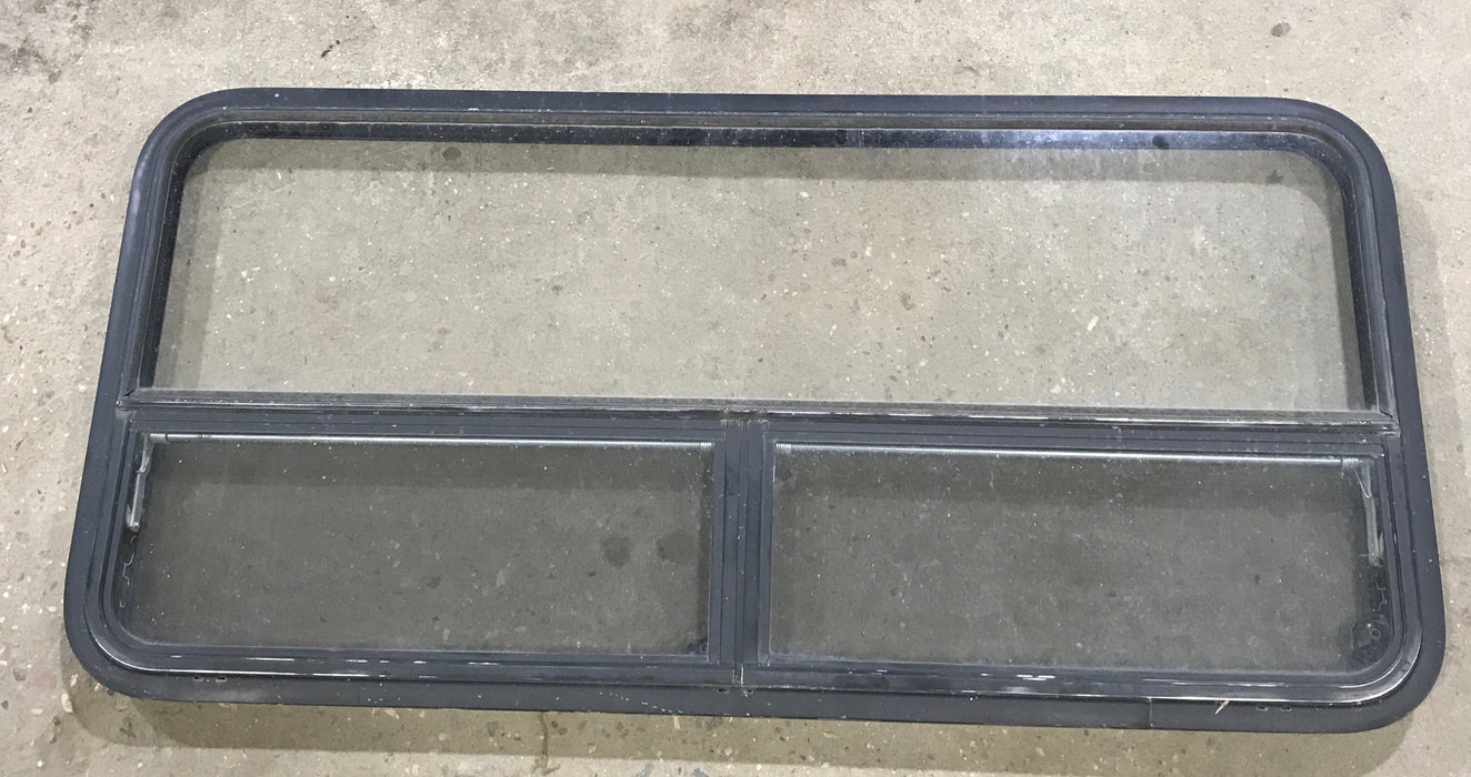 Used Black Radius Window : 53 1/4" W x 25 1/4" H x 2 1/4" D
