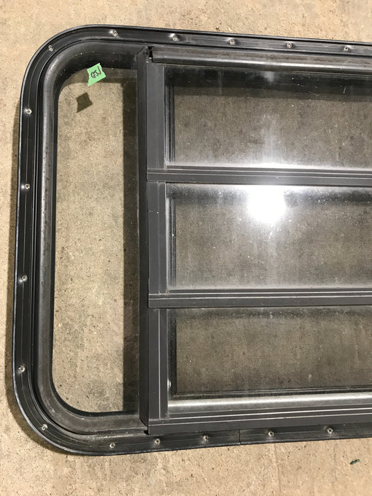 Used Black Radius Opening Window : 42 1/2" W x 22 1/2" H x 1 1/2" D