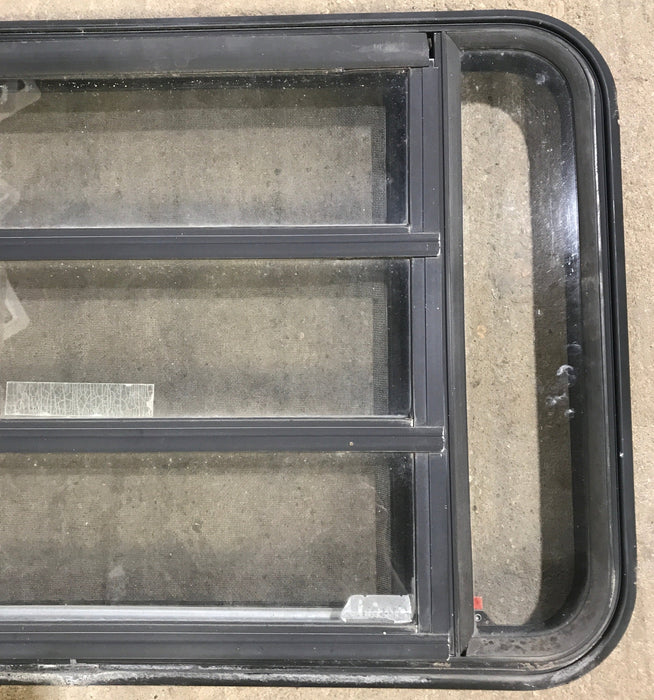 Used Black Radius Emergency Opening Window : 35" W x 21 1/4" H x 1 7/8" D