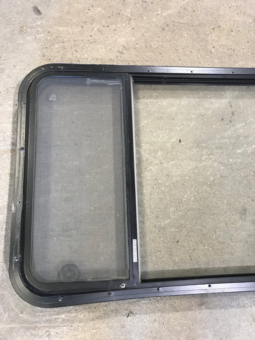 Used Black Radius Opening Window : 23 1/2" W x 52" H x 1 7/8"