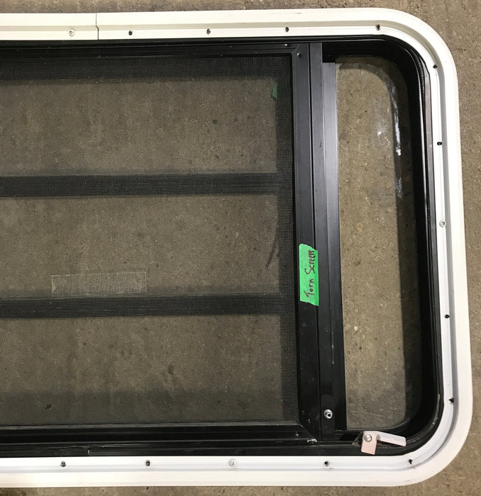 Used Black Radius Emergency Opening Window : 35" W x 21 1/4" H x 1 7/8" D