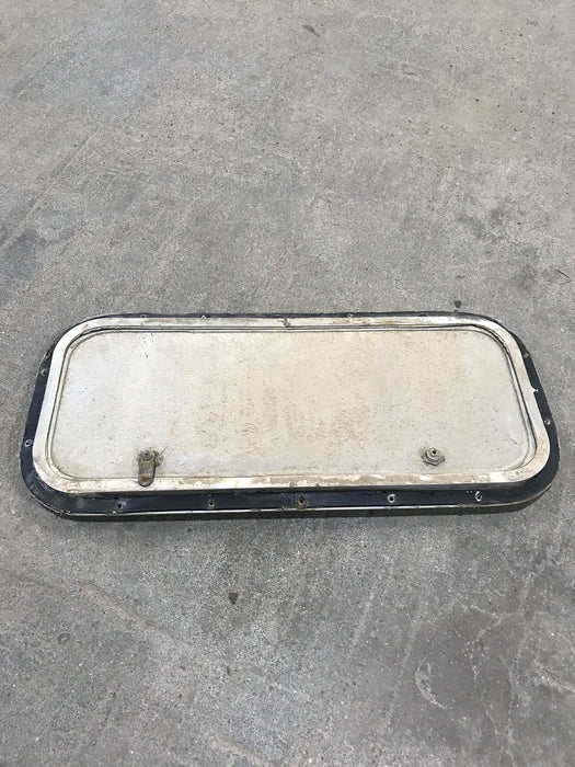 Used Radius Cargo / compartment Door 23 3/4" W x 9 3/4" H