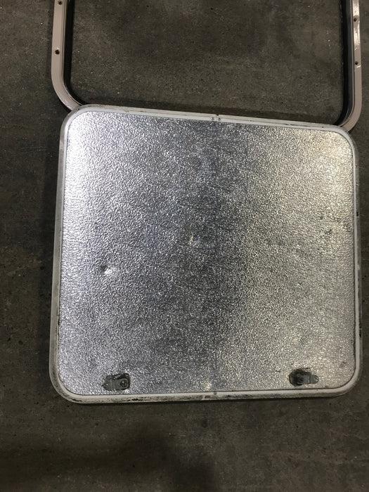 Used Radius Corner cargo door  23 3/4" W  x 21 3/4" H x  1/2" D