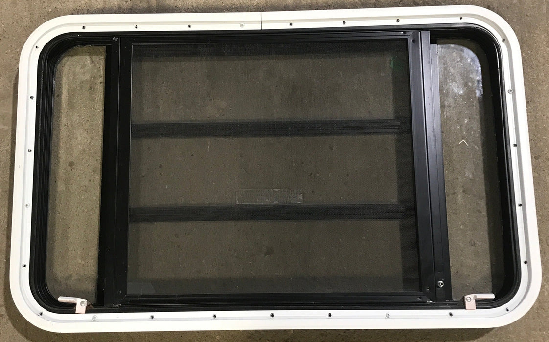 Used Black Radius Emergency Opening Window : 35 1/4" W x 21 1/4" H x 1 7/8" D