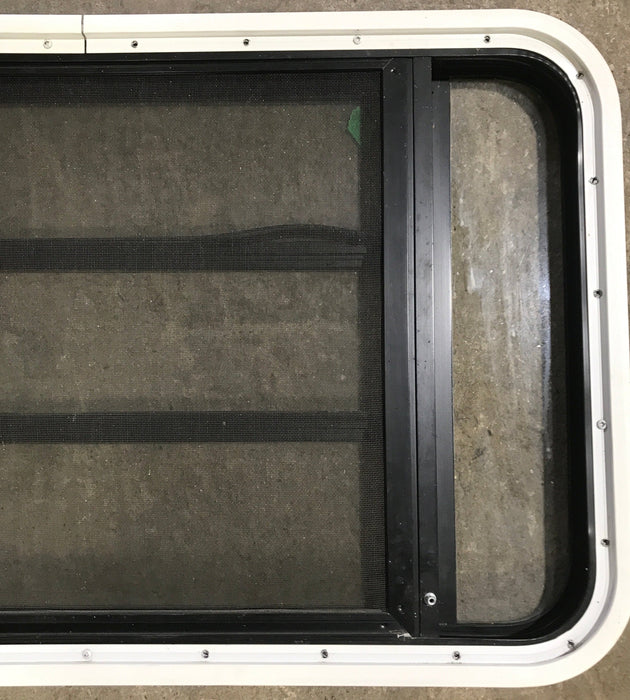Used Black Radius Opening Window : 35 1/4" W x 21 1/4" H x 1 7/8" D