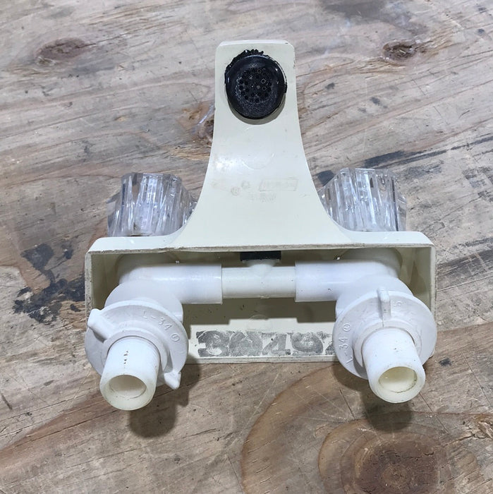 Used 4" Bathroom Faucet, Bone, Clear Knobs