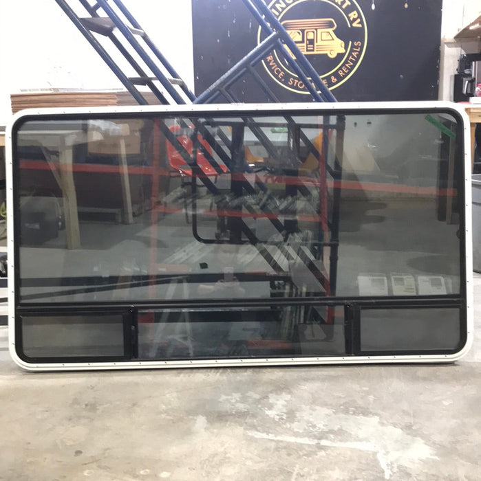 Used Black Radius Window : 69 3/4" W x 39 1/4" H x 1 1/4" D - Young Farts RV Parts
