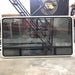 Used Black Radius Window : 69 3/4" W x 39 1/4" H x 1 1/4" D - Young Farts RV Parts