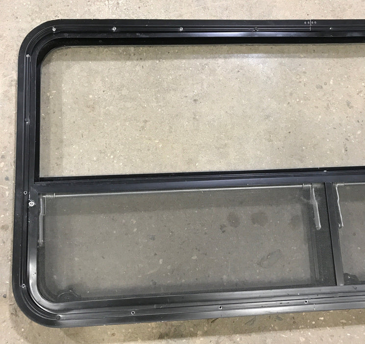 Used Black Radius Window : 53 1/4" W x 25 1/4" H x 2 1/4" D