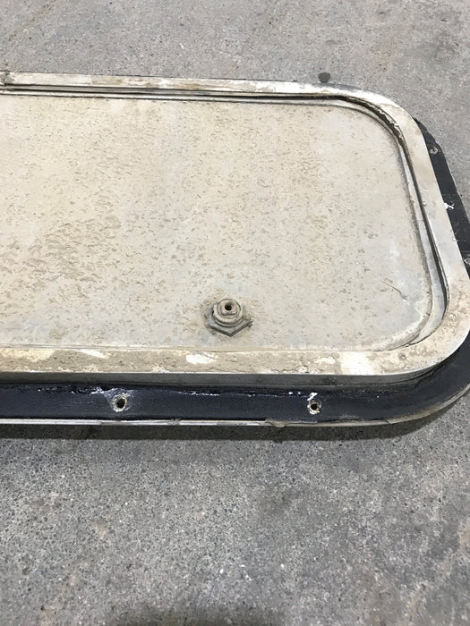 Used Radius Cargo / compartment Door 23 3/4" W x 9 3/4" H