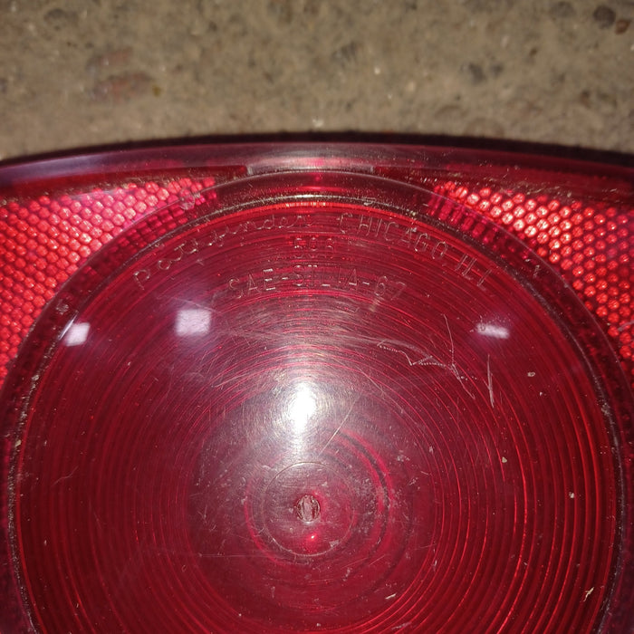 Used SAE-STLIA-67 596 License Plate Replacement Lens with Bracket-596