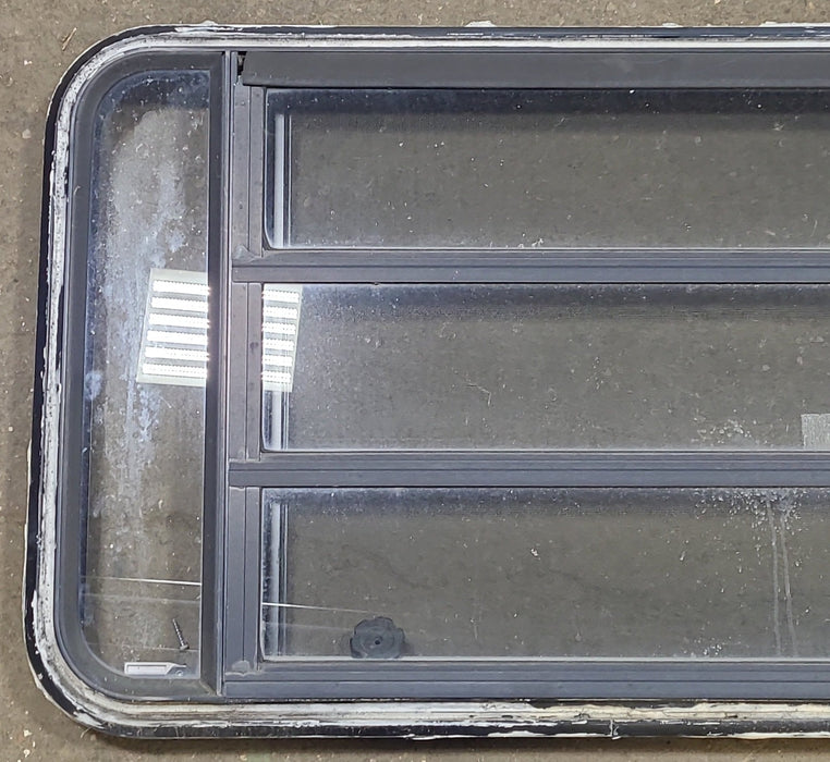 Black Radius Emergency Opening Window : 35" W X 21 1/4" H X 2" D