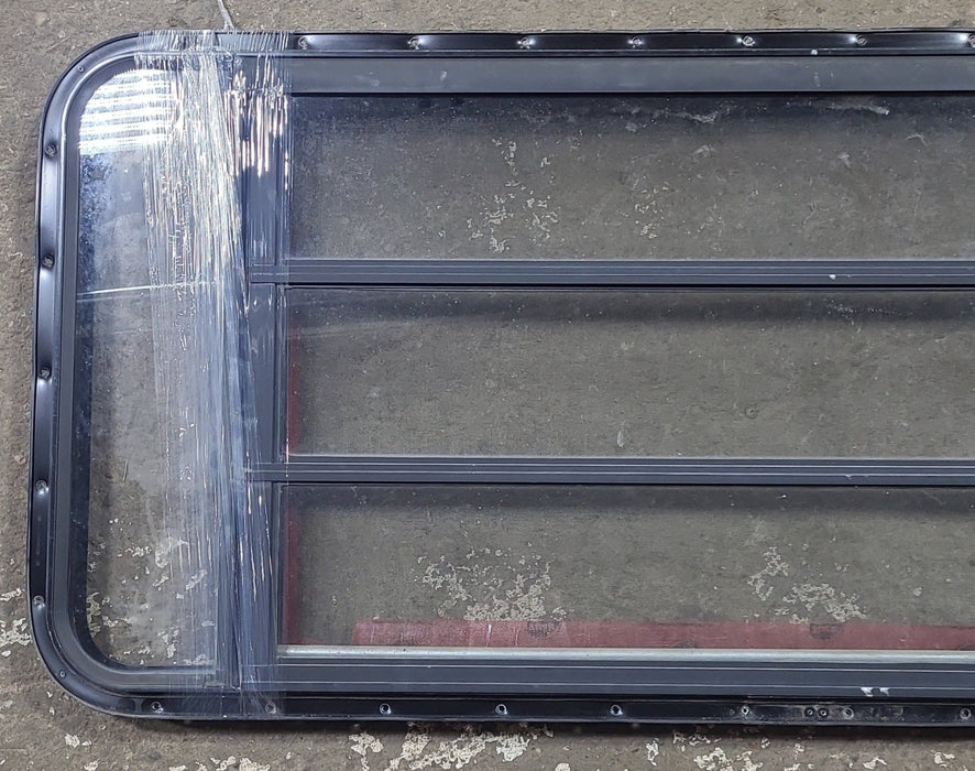 Black Radius Opening Window : 49 1/2" W x 23 1/2" H x 1 3/4" D