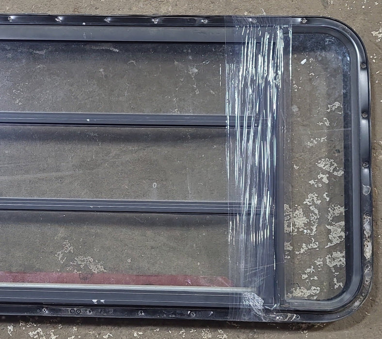 Black Radius Opening Window : 49 1/2" W x 23 1/2" H x 1 3/4" D