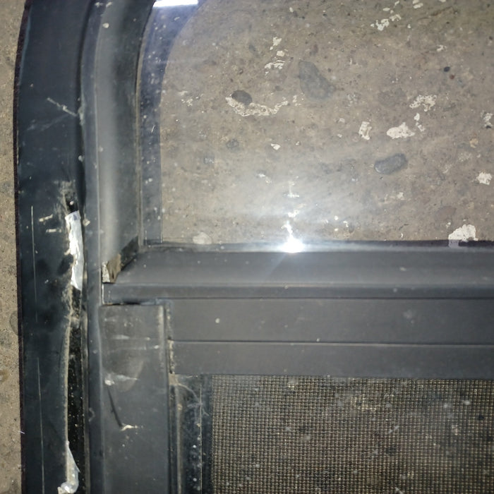 Used Young Farts RV Parts Black Radius Louvered Window : 23.5" x 14 3/8" x 2"