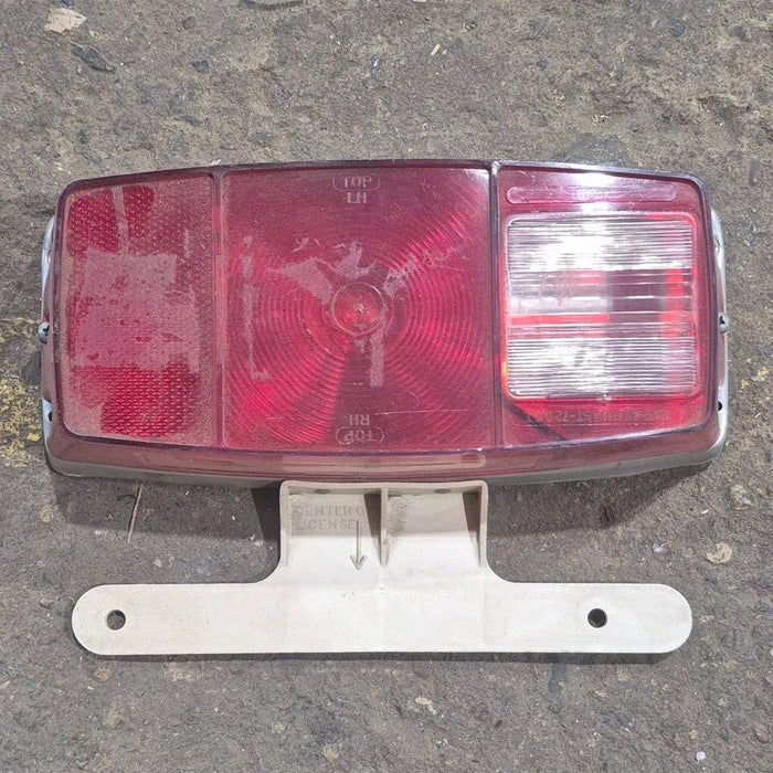Used Miro-Flex RV Tail Light Assembly, With License Plate Bracket,  10 1/8" X 7" X 2 3/4" - 340