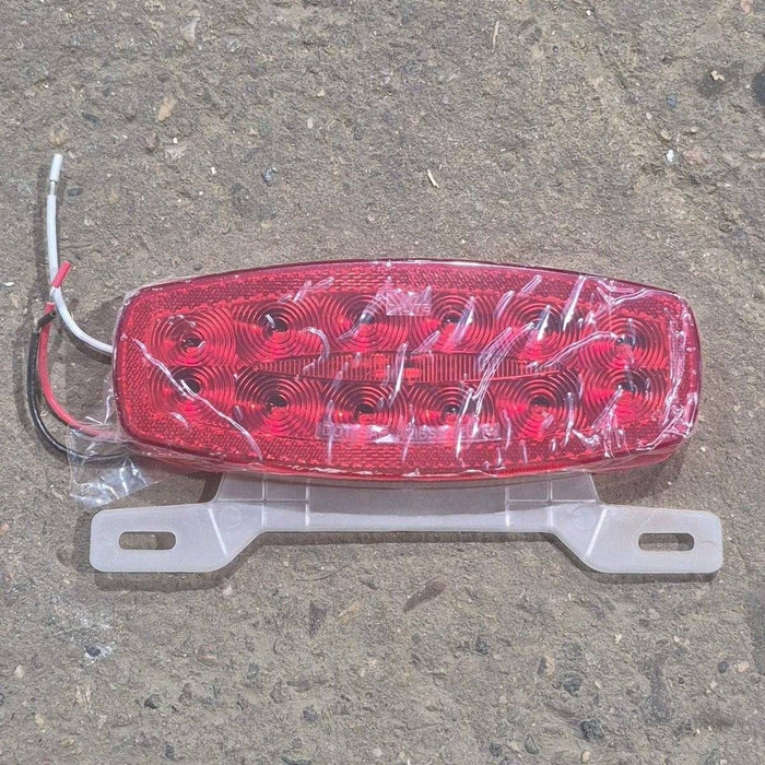 Used RV Tail Light Assembly, With License Plate Bracket, 8.625" x 4.125" x 1.25"- DOT SAE A2I6S2T2L 18