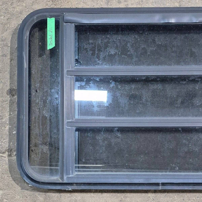 Used Black Radius Opening Window - 35 1/8" X 21 1/4" X 1 7/8"