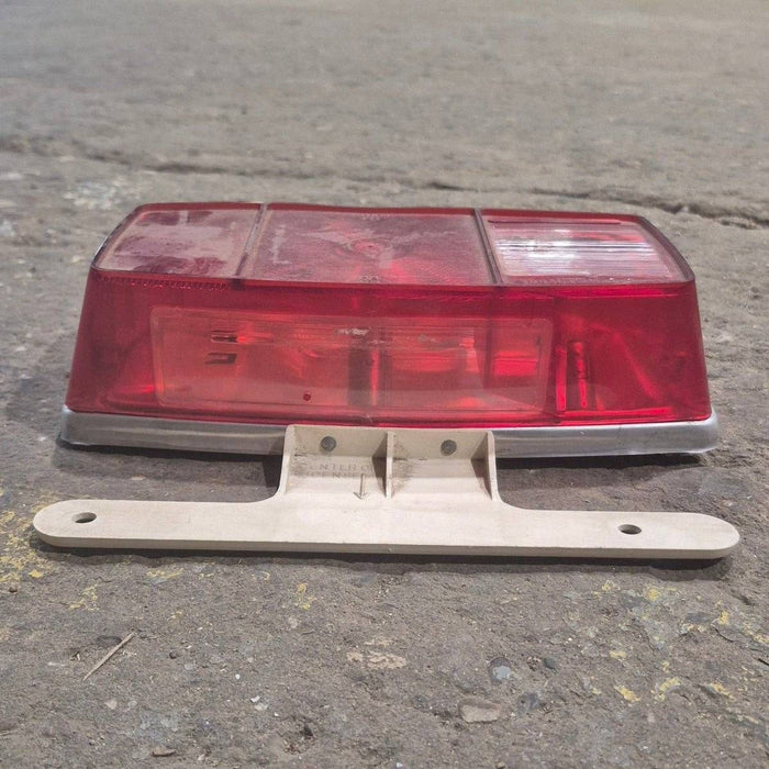 Used Miro-Flex RV Tail Light Assembly, With License Plate Bracket,  10 1/8" X 7" X 2 3/4" - 340