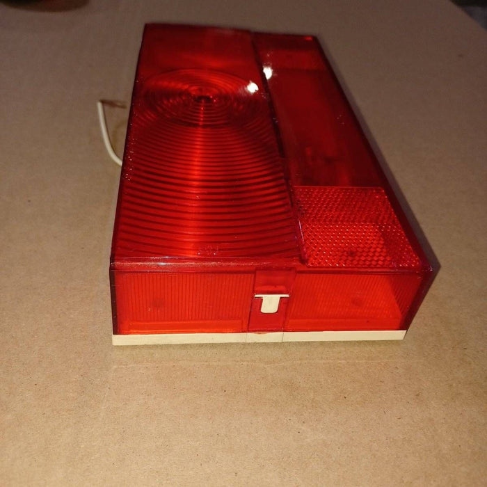 Used Reflect-O-Lite Tail Light Replacement Lens - SAE-AILRST-73 D.O.T. , No. 910-950
