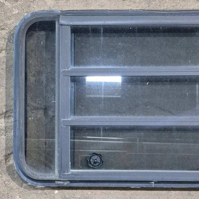 Used Black Radius Opening Window - 35 1/8" X 21 1/4" X 1 7/8"