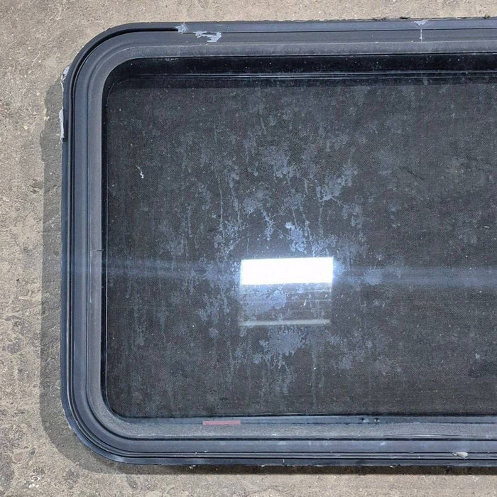 Used Black Radius Emergency Opening Window - 35 1/8" X 21 1/4" X 1 7/8"