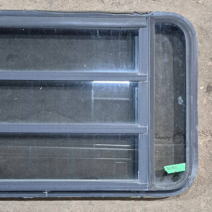 Used Black Radius Opening Window - 35 1/8" X 21 1/4" X 1 7/8"