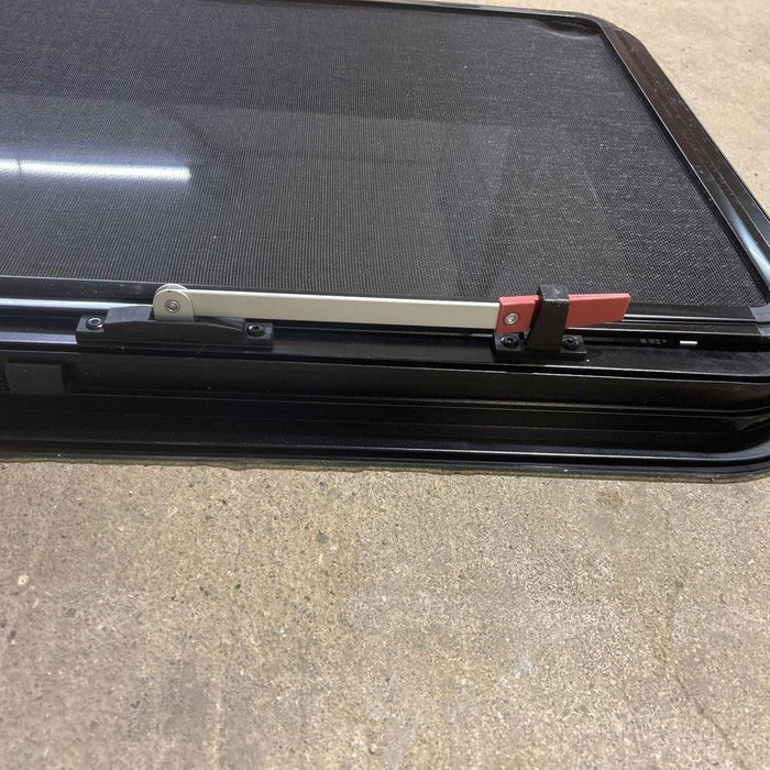 Used Black Radius Frameless Emergency Opening Window : 29 1/2" X 21 1/2 X 1 7/8" D
