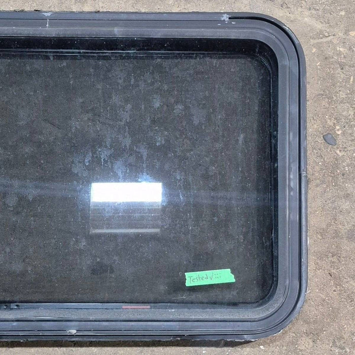 Used Black Radius Emergency Opening Window - 35 1/8" X 21 1/4" X 1 7/8"