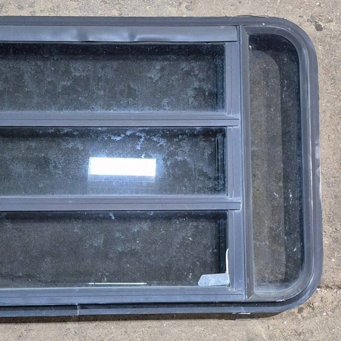 Used Black Radius Opening Window - 35 1/8" X 21 1/4" X 1 7/8"