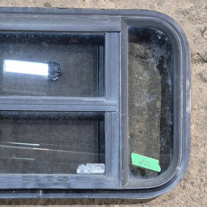 Used Black Radius Opening Window - 23 1/8" X 14 1/2" X 1 7/8"
