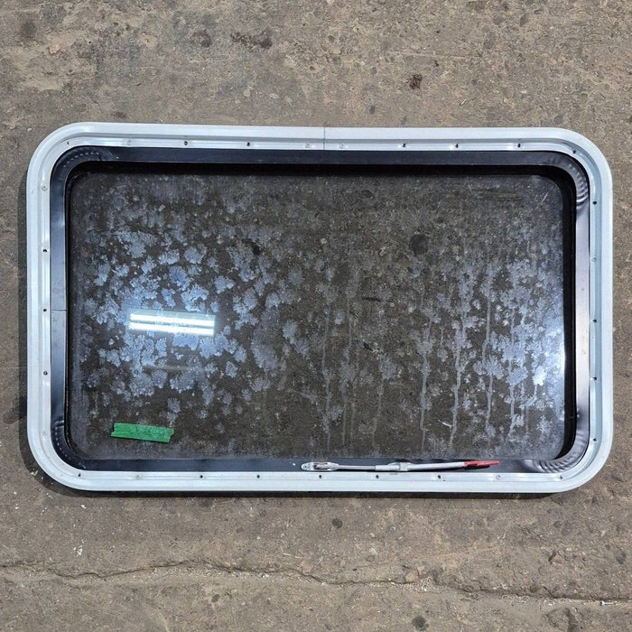 Used Black Radius Emergency Opening Window - 35 1/8" X 21 1/4" X 1 7/8"