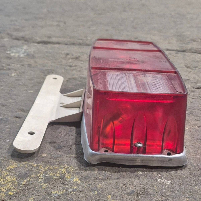 Used Miro-Flex RV Tail Light Assembly, With License Plate Bracket,  10 1/8" X 7" X 2 3/4" - 340