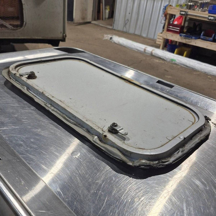 Used Radius Cornered Cargo Door - 21 7/8" X 11 3/4" X 1/2"