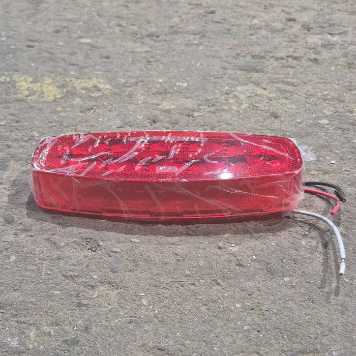 Used RV Tail Light Assembly, With License Plate Bracket, 8.625" x 4.125" x 1.25"- DOT SAE A2I6S2T2L 18