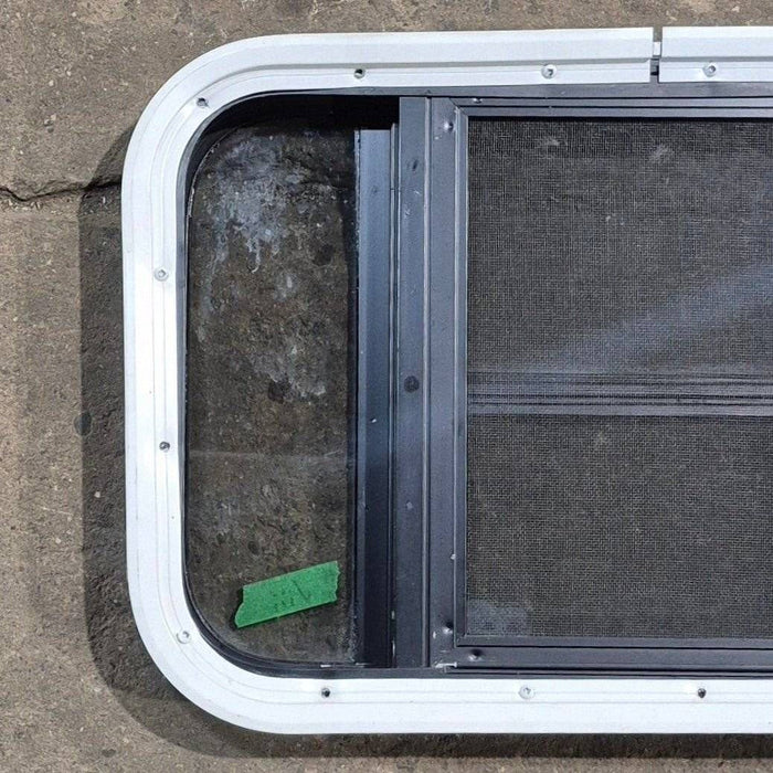 Used Black Radius Opening Window - 23 1/8" X 14 1/2" X 1 7/8"